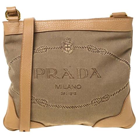 prada logo canvas and leather trimmed bag|Prada logo crossbody bag.